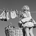 1950s Back View Of Girl Hanging Laundry